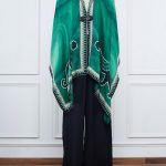 Green animal printed cape by Kamaali Pret